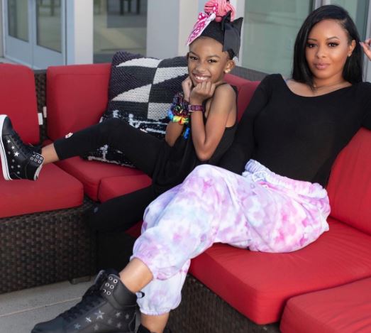 Ava Marie Jean Wayans modeling for sneakers with her mother Vanessa Simmons